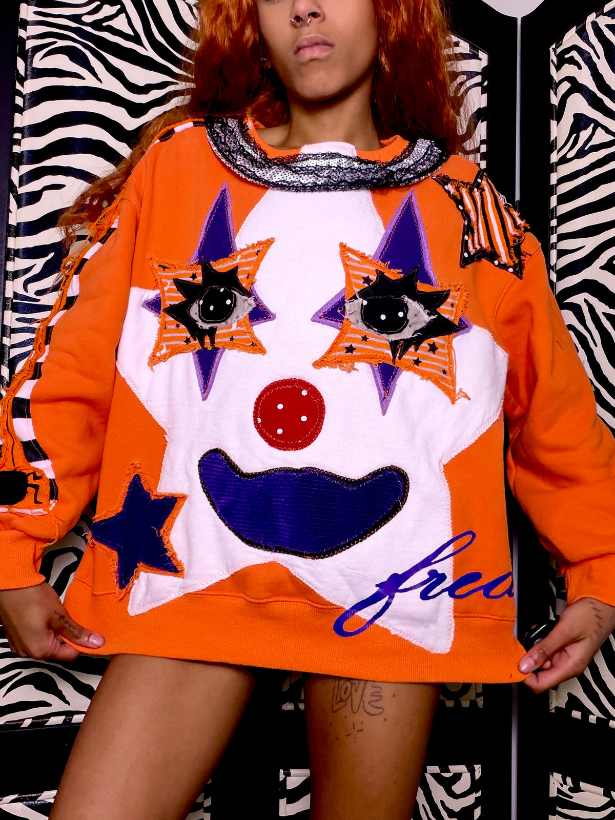 Orange star clown girl sweater